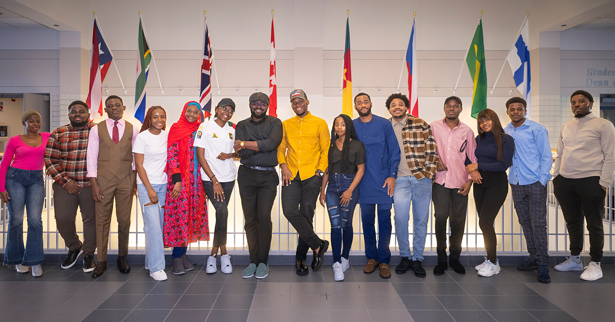 A group of SUNY Canton’s Cameroon Students stand outside of the International Programs office.