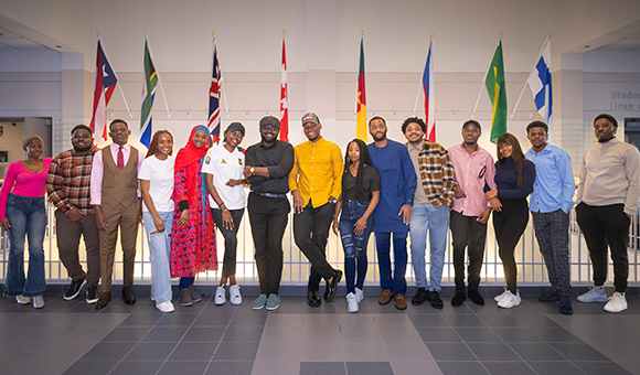 A group of SUNY Canton’s Cameroon Students stand outside of the International Programs office.