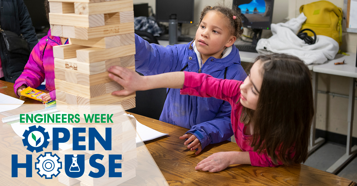 Engineer's Week Open House - Two young students play Jenga during Engineer's Week Open House.