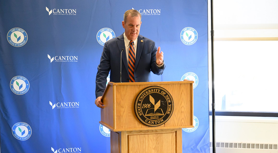 Assemblyman Scott Gray speaks from a podium at the ASAP|ACE event.